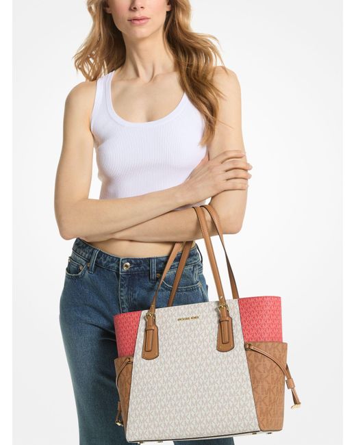 Michael kors east 2024 west voyager tote