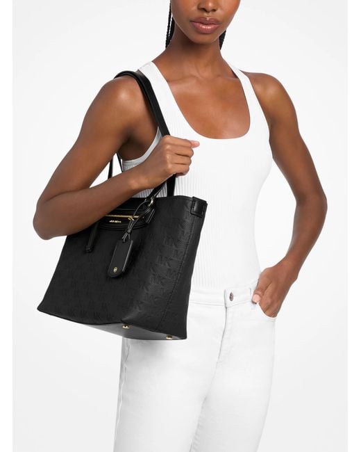 MICHAEL Michael Kors Black Mk Jet Set Travel Medium Logo Embossed Leather Tote Bag
