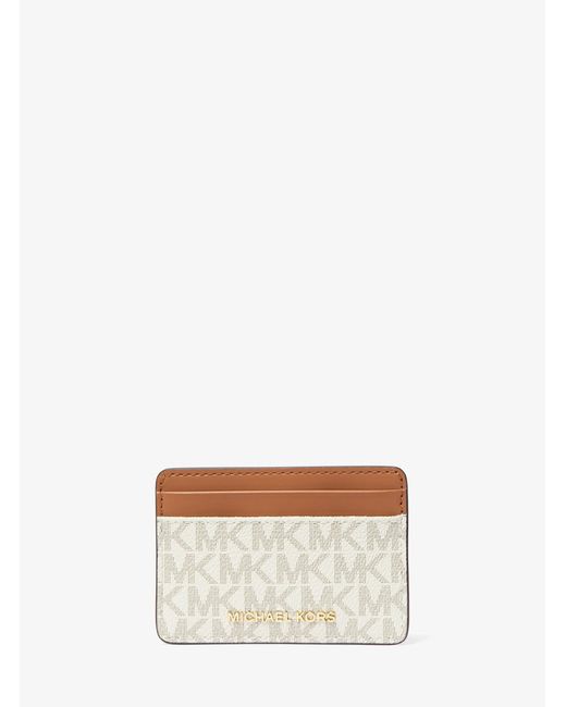 MICHAEL Michael Kors White Michael Kors Jet Set Monogram Coated Canvas Purse