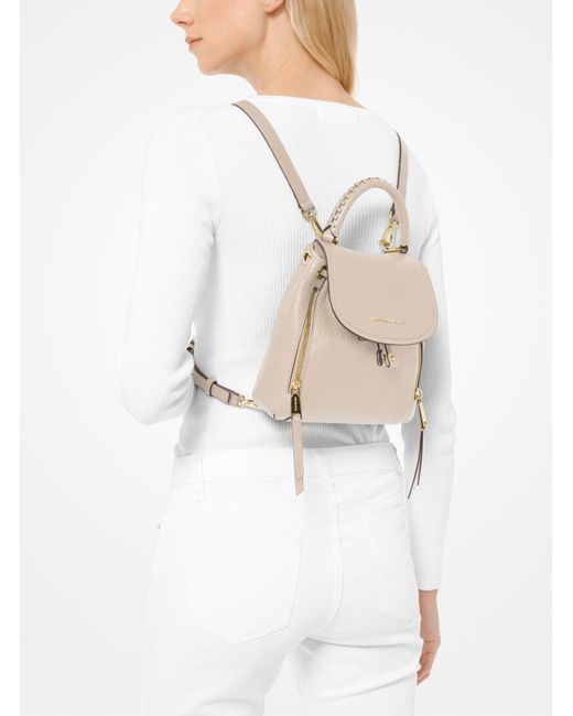 Michael Kors Viv Extra-small Pebbled Leather Backpack in Natural | Lyst