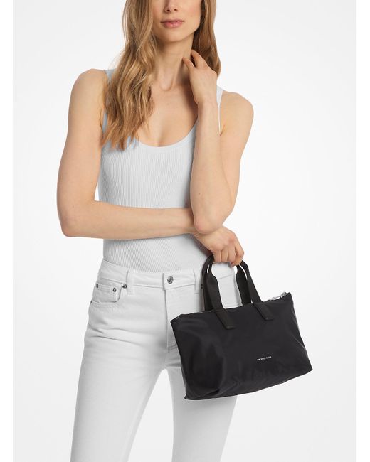 Mkbolso Tote Tanner Pequeño, Plegable Y Reversible Con Estampado De Logotipos MICHAEL Michael Kors de color Black