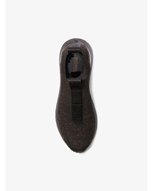 Zapatilla Bodie de punto elástico metalizado sin cordones con cinta de logotipo MICHAEL Michael Kors de color Black