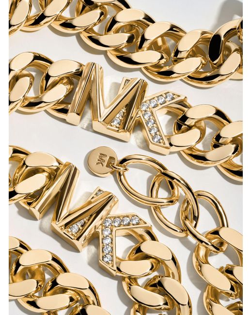 Bracelet à maillons gourmette en laiton plaqué en métal précieux avec pierres pavées et logo Michael Kors en coloris Metallic