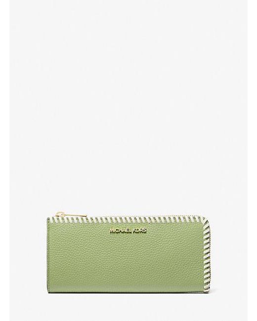 Jet set travel online large pebbled leather wristlet
