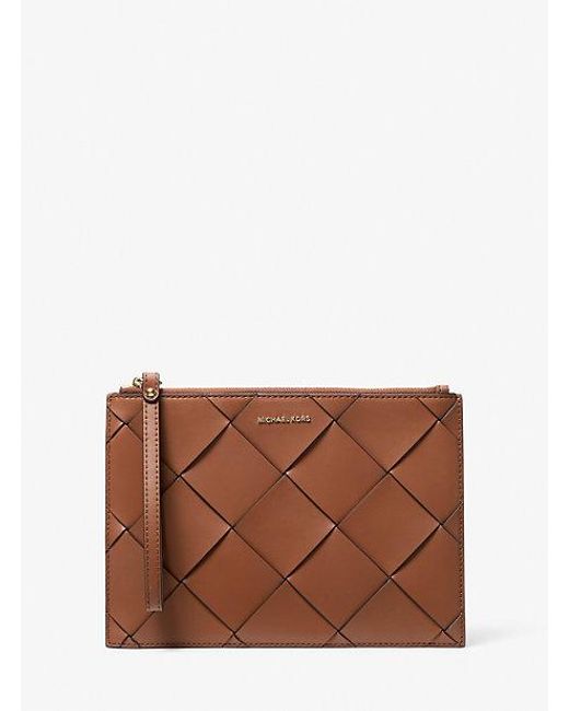 Mkbolso De Pulsera Jet Set Travel Extragrande De Piel Tejida MICHAEL Michael Kors de color Brown