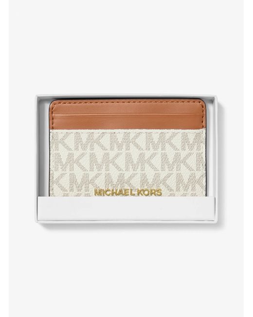 MICHAEL Michael Kors White Michael Kors Jet Set Monogram Coated Canvas Purse