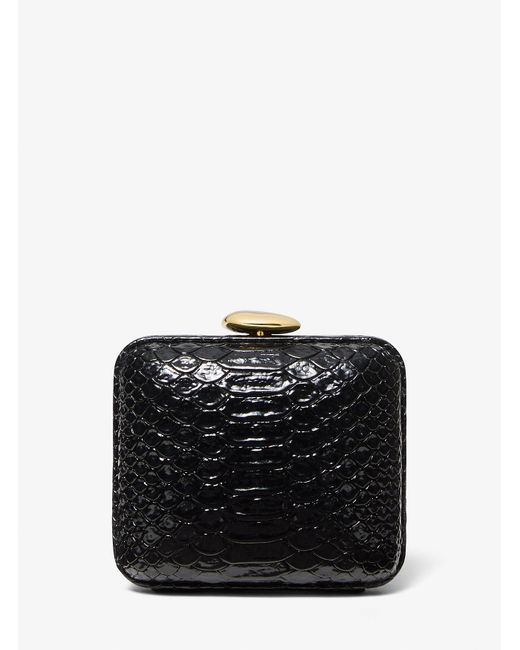 Bolso minaudière Tina mini de piel con motivo de pitón en relieve Michael Kors de color Black