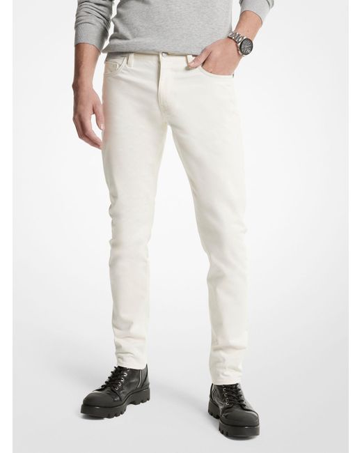 Jeans in denim stretch spazzolato di Michael Kors in White da Uomo