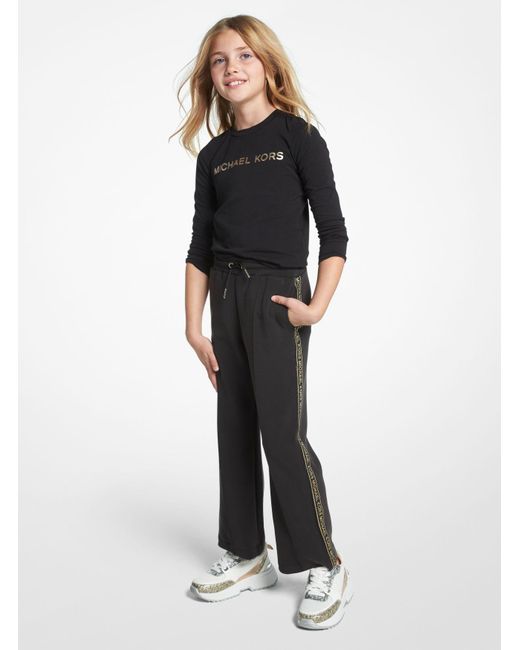 Pantalon de survêtement en jersey extensible avec bande à logos métallisée Michael Kors en coloris Black