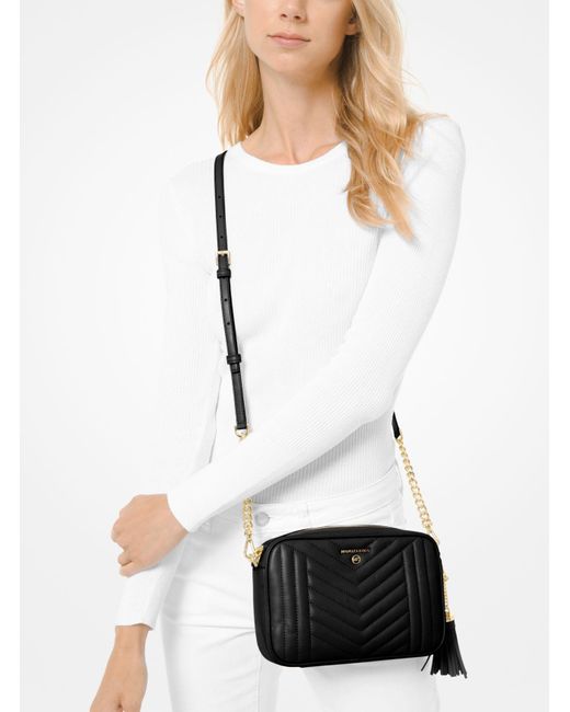 Borsa Per Fotocamera Jet Set Media In Pelle Trapuntata di Michael Kors in  Nero | Lyst