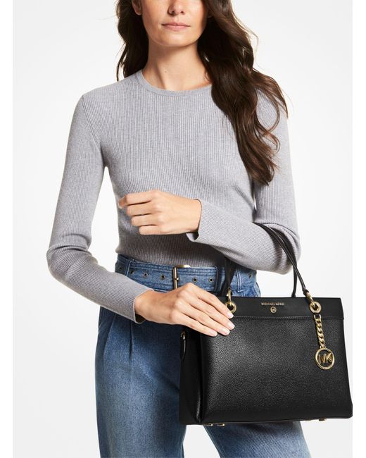 Borsa a mano Susan in pelle martellataMichael Kors in Pelle di colore Nero  | Lyst