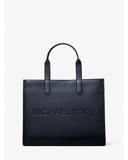 Michael Kors Cooper Logo Embossed Pebbled Leather Tote Bag in Blue