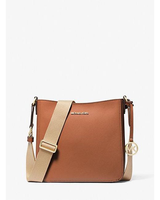 Mk Borsa Messenger Jet Set Travel Piccola di Michael Kors Outlet in Brown