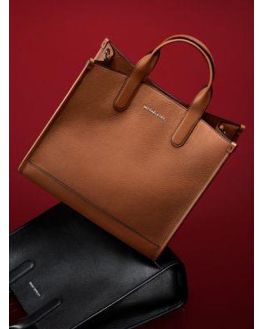 Michael Kors Black Mk Hudson Pebbled Leather Tote Bag for men