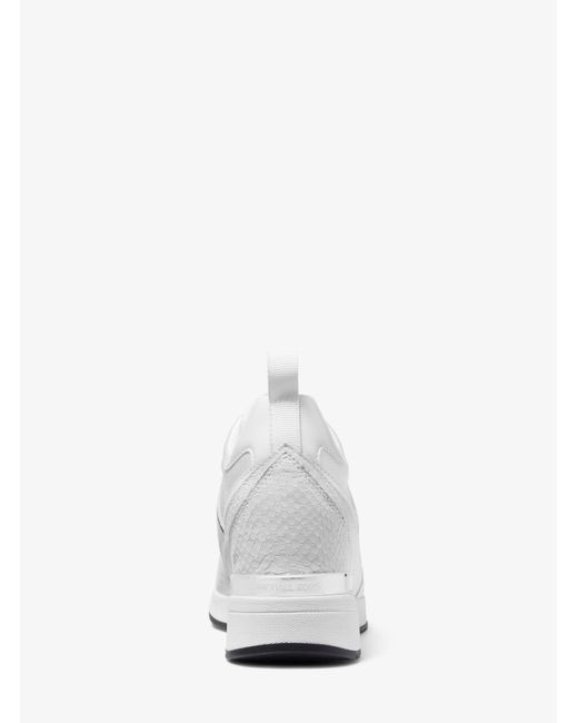 Michael Kors Maven Mixed-media Slip-on Trainer in White | Lyst
