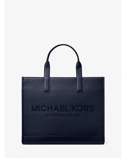 Michael Kors Blue Cooper Logo Embossed Faux Pebbled Leather Tote Bag for men