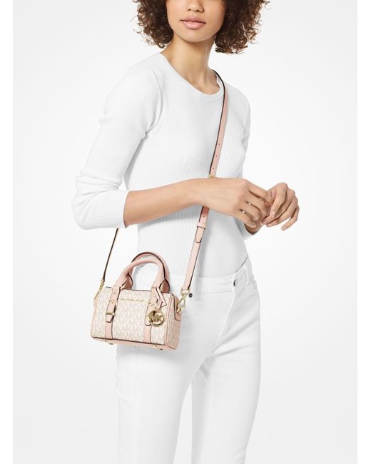 Michael Kors Bedford Legacy Extra small Logo Duffle Crossbody Bag in Pink Lyst UK