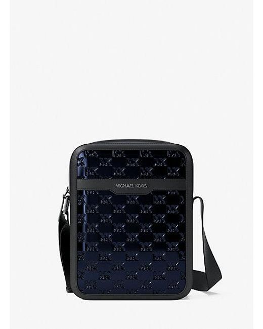 Michael Kors Cooper Metallic Logo Debossed Flight Bag in Blue for