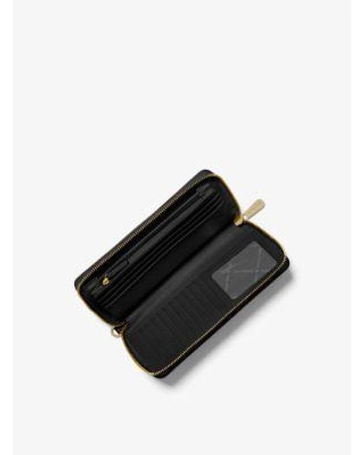 Michael Kors White Jet Set Travel Large Pebbled Leather Wristlet