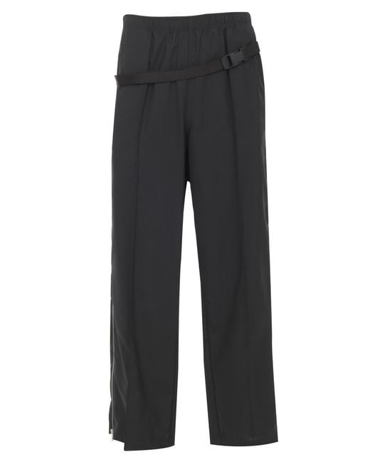 Maison Margiela Black-wool Trousers With Side Bumbag, Elasticated Waist And Side Zip for men