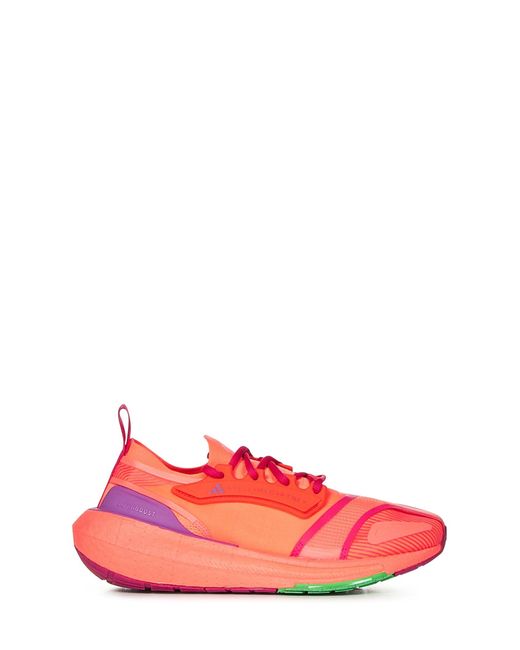 Sneakers Ultraboost Light di Adidas By Stella McCartney in Red