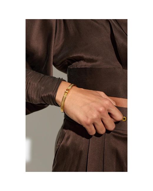 COACH Metallic Messingarmband