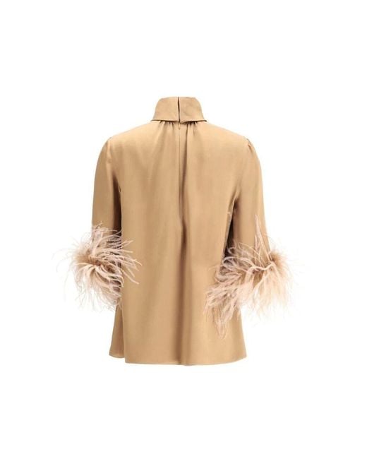 Blusa con piume e collo alto di Dolce & Gabbana in Natural