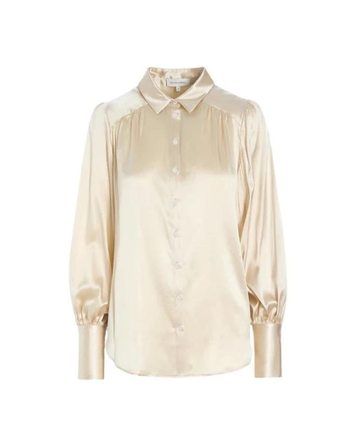Blusa de seda elástica con mangas de volumen - perla de Dea Kudibal de color  Neutro | Lyst