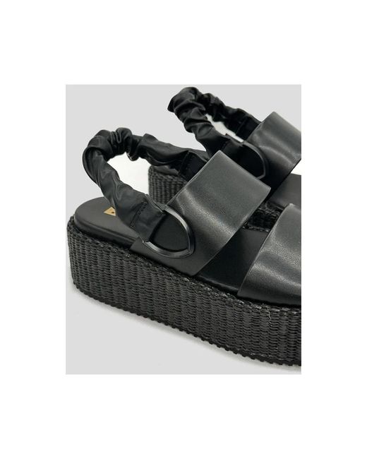 Wedges Blauer en coloris Black