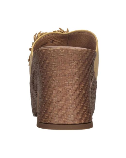 Heeled Mules Chie Mihara en coloris Brown