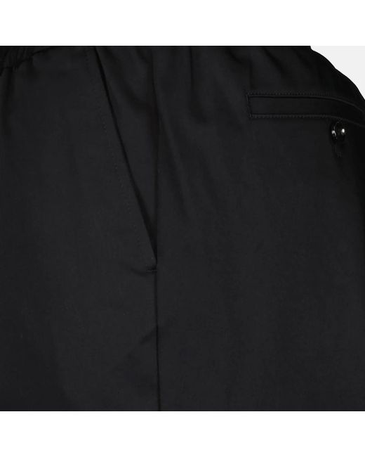 Trousers > slim-fit trousers AMI pour homme en coloris Black