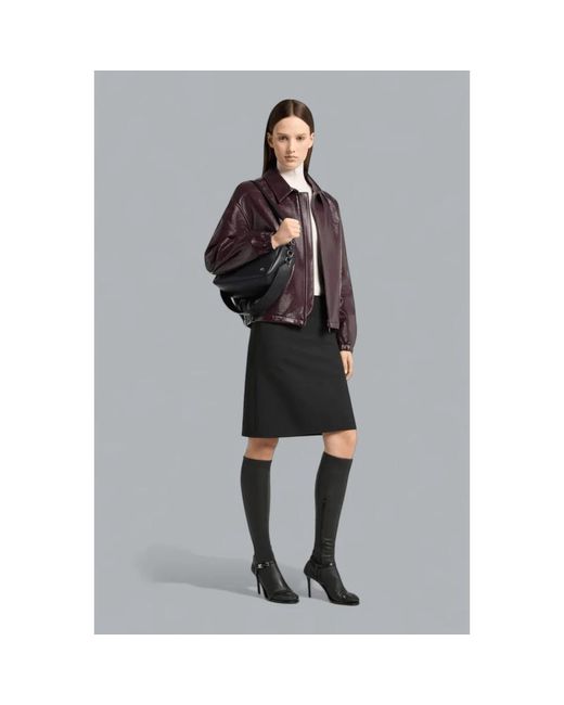 Courreges Black Cross Body Bags
