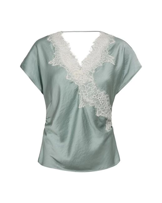Blouses co'couture de color Green