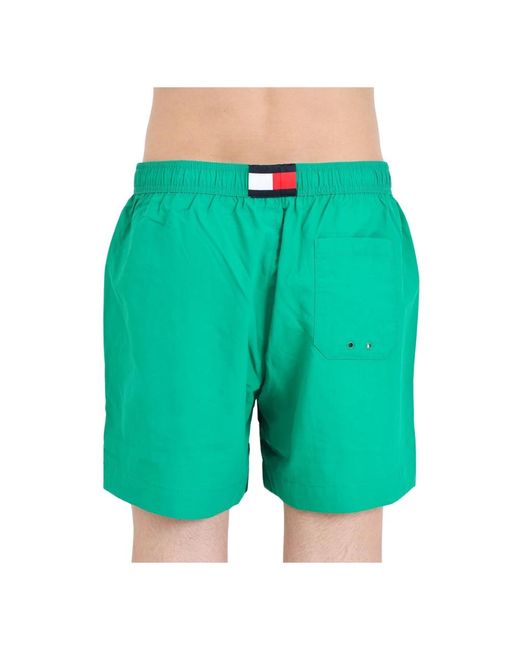 Tommy Hilfiger Grüne beachwear-shorts mit flaggen-detail in Green für Herren