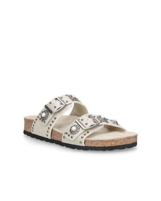 Elena Iachi White Sliders