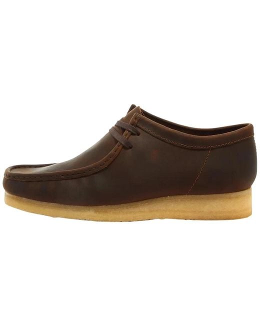 Clarks Bronzefarbene Schnürstiefel in Brown für Herren