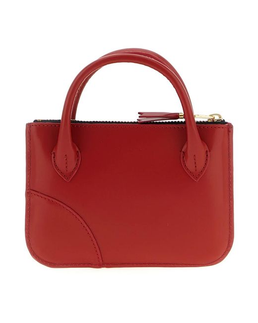 Comme des Garçons Red Handbags