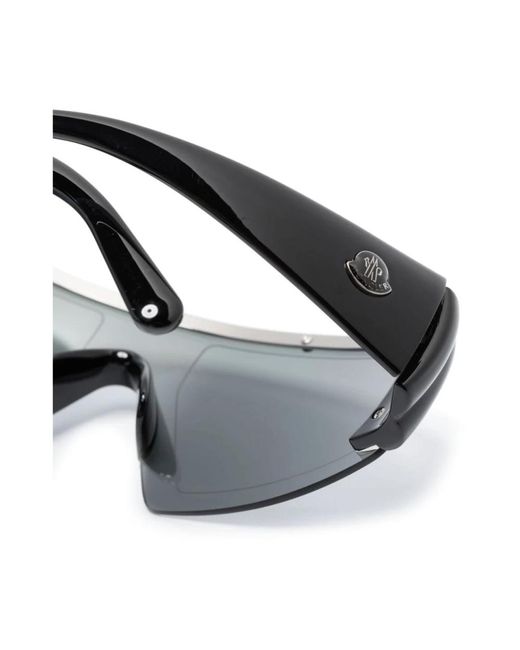 Moncler Black Schwarze sonnenbrille mit original-etui