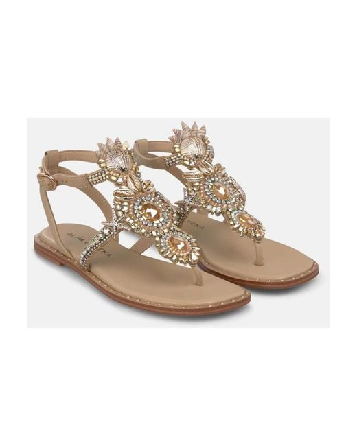 Alma En Pena. Metallic Flat Sandals