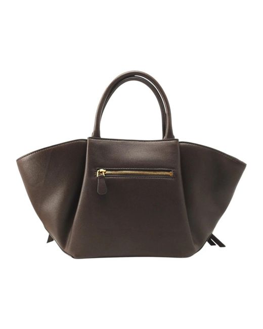 Handbags di Guess in Brown