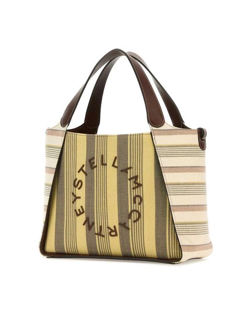 Handbags Stella McCartney de color Metallic
