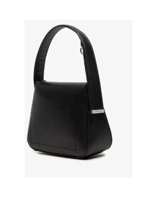 Handbags di Calvin Klein in Black