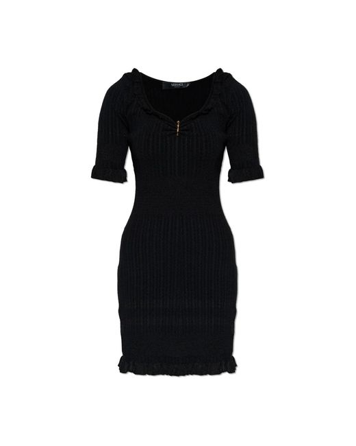 Short Dresses di Versace in Black