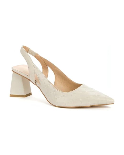 Betsy White Pumps