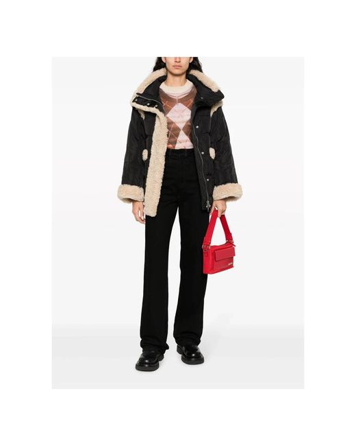 Faux Fur & Shearling Jackets di Stand Studio in Black