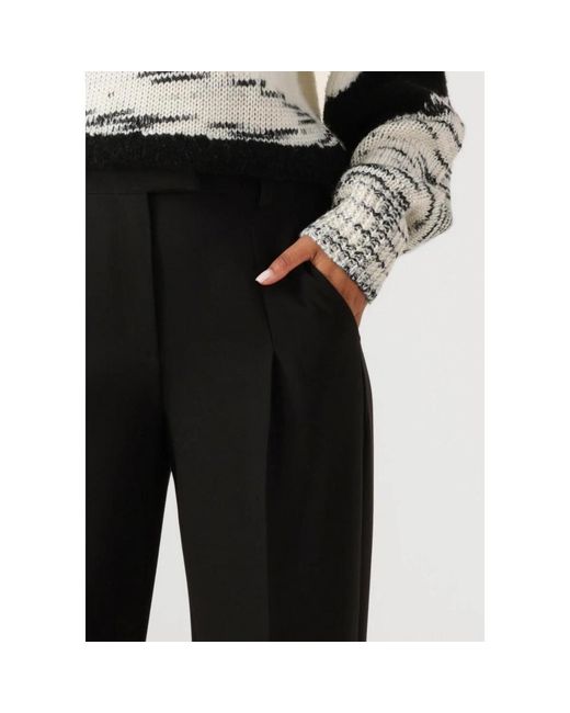 Another Label Broeken ,Zwart ,Zwarte Geplooide Broek Voor Stijlvolle Herfst/Winter Look in het Black