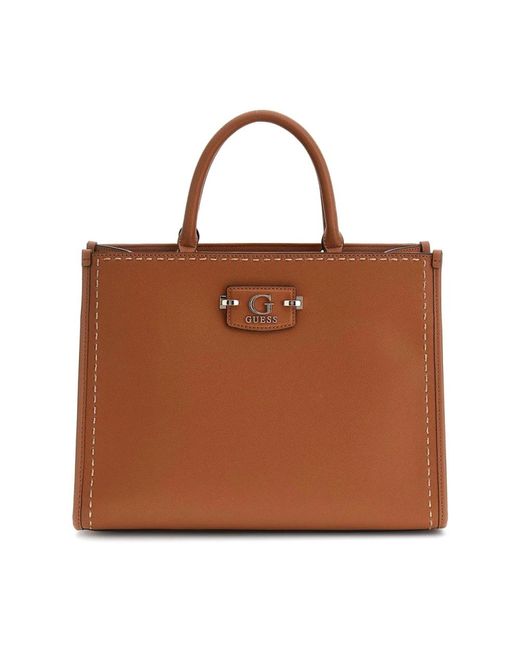 Handbags di Guess in Brown