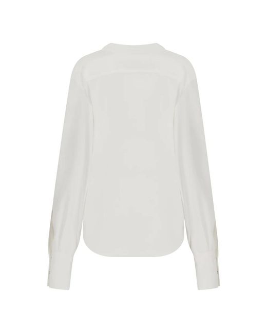 The Mannei White Blouses