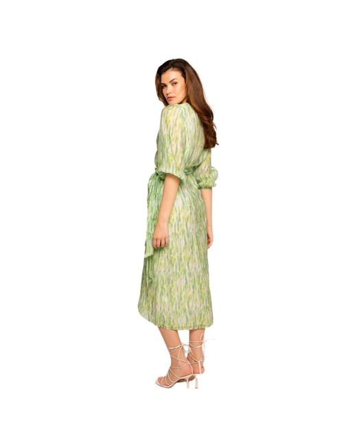 Freebird by Steven Green Wrap Dresses