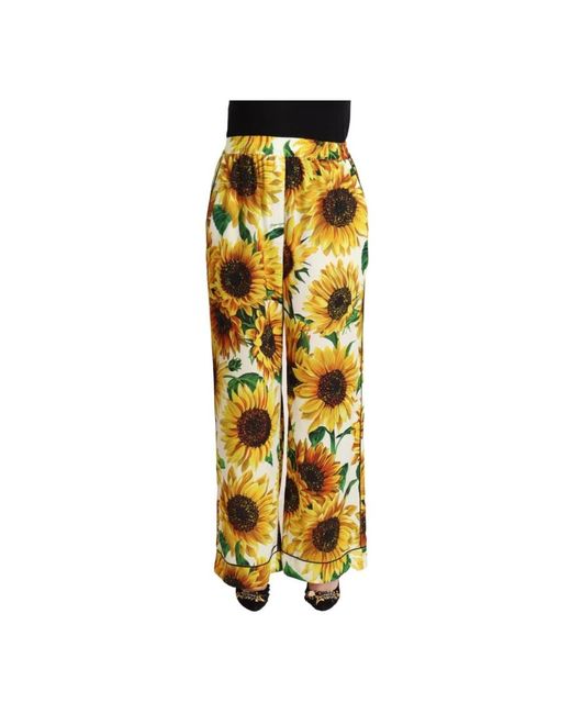 White sunflower print mid waist wide leg pants di Dolce & Gabbana in Metallic
